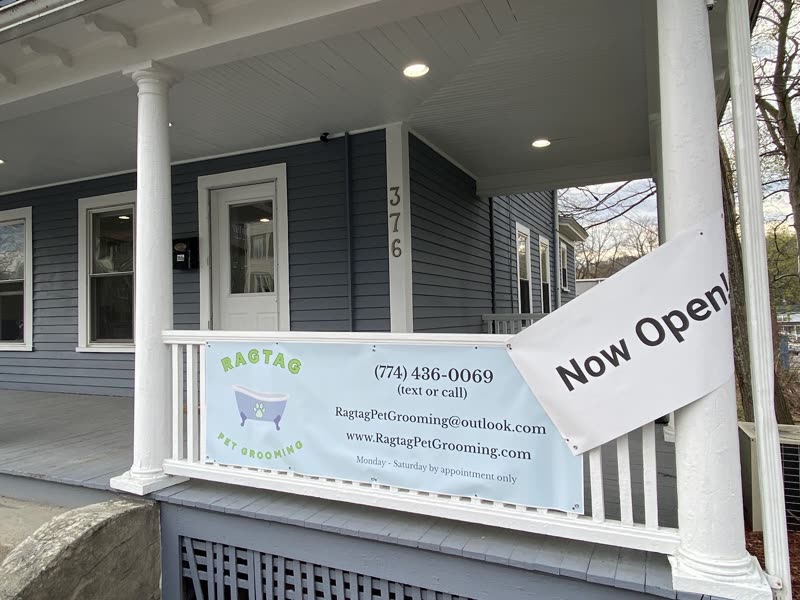 The grey-blue clapboard house on Chandler Street where Ragtag Pet Grooming works